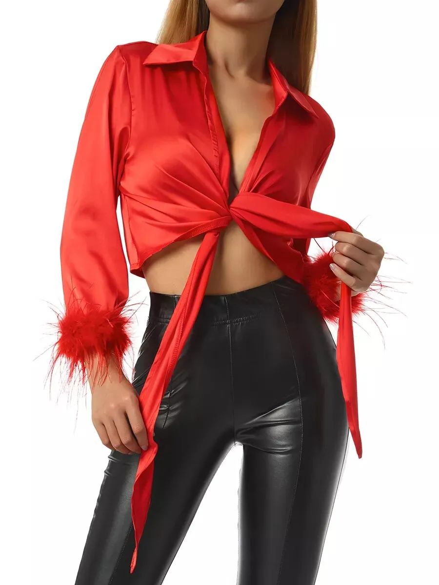 Red satin blouse with feathers